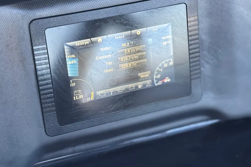 Slide: The Image of Dashboard display of a 2019 Yamaha Boats SX190 showing fuel, water temperature, and trip data. - 25