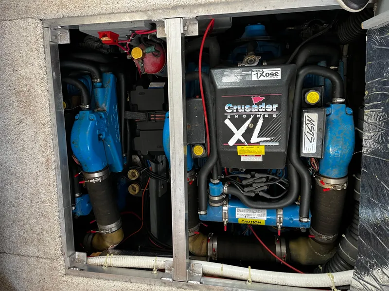 Slide: The Image of Engine compartment of a 1996 Carver 325 Aft Cabin with Crusader XL engines. - 35