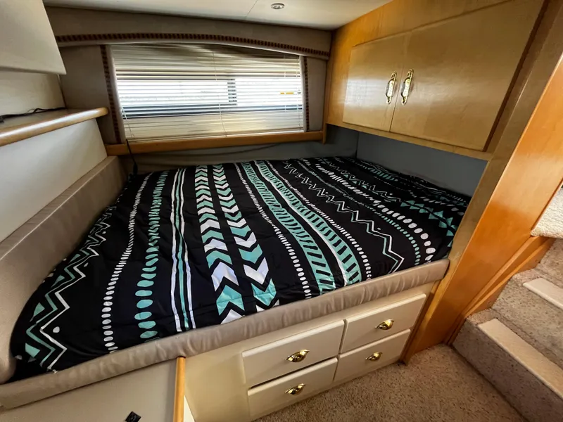 Slide: The Image of 1996 Carver 325 Aft Cabin dashboard with fuel, volt, PSI, temperature, and engine hour gauges. - 34