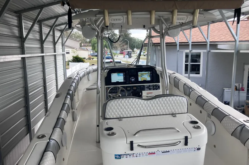 Slide: The Image of 2008 Hydra-Sports Vector 2900 CC boat interior with navigation equipment under a metal canopy. - 10