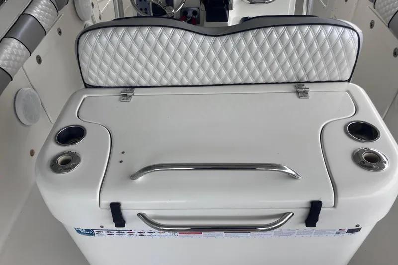 Slide: The Image of 2008 Hydra-Sports Vector 2900 CC boat interior with cushioned seating and cup holders. - 14