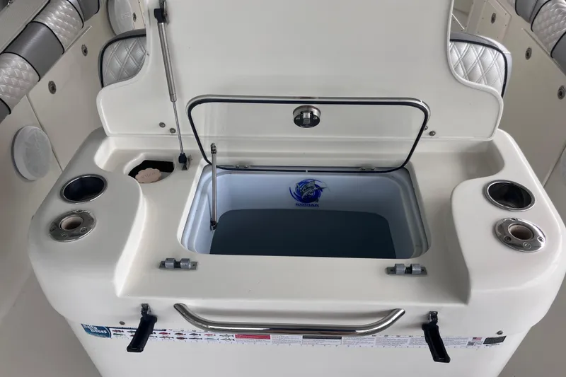 Slide: The Image of Livewell on 2008 Hydra-Sports Vector 2900 CC boat, featuring rod holders and storage. - 16