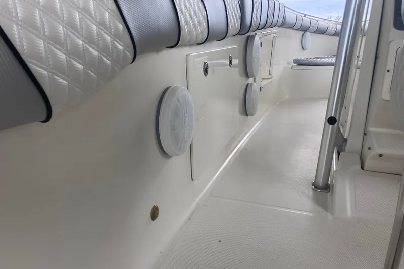 Slide: The Image of 2008 Hydra-Sports Vector 2900 CC interior with cushioned seating and marine speakers. - 17