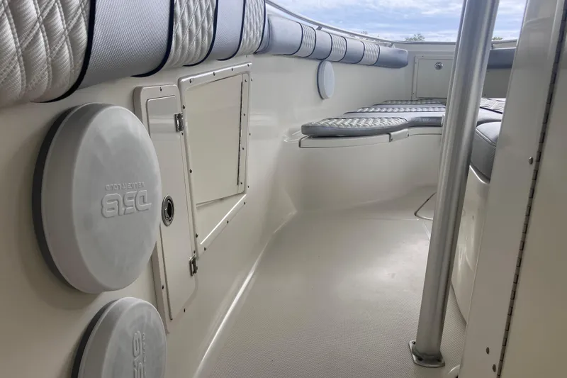 Slide: The Image of 2008 Hydra-Sports Vector 2900 CC interior with cushioned seating and storage compartments. - 18