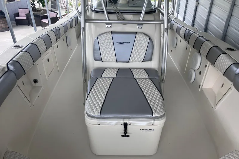 Slide: The Image of 2008 Hydra-Sports Vector 2900 CC boat interior with cushioned seating and storage. - 23
