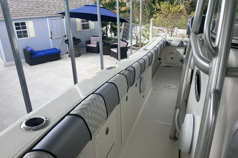 Slide: The Image of 2008 Hydra-Sports Vector 2900 CC boat interior with cushioned seating and outdoor patio view. - 25