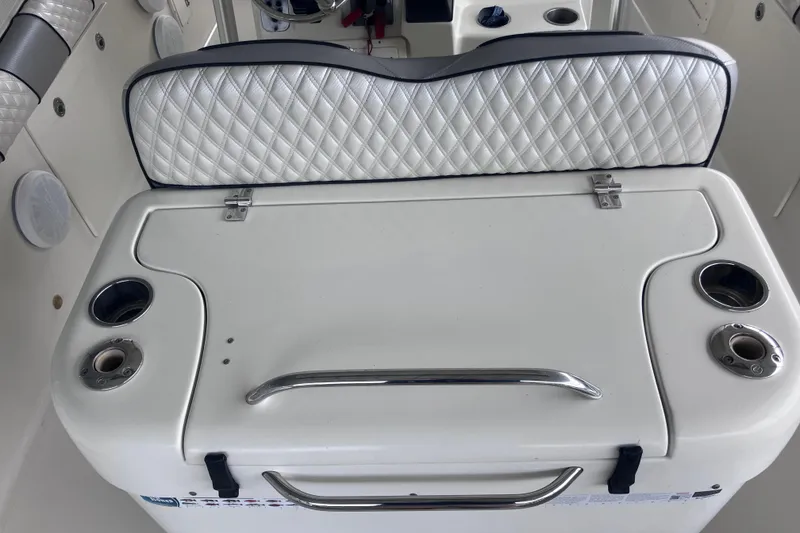 Slide: The Image of 2008 Hydra-Sports Vector 2900 CC boat interior with cushioned seating and cup holders. - 29