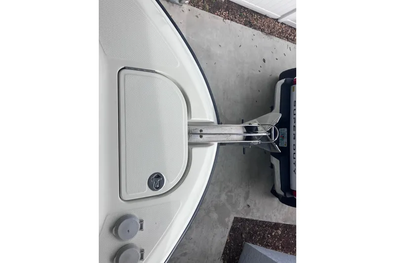 Slide: The Image of 2008 Hydra-Sports Vector 2900 CC boat bow with anchor, parked near a Super Duty truck. - 35