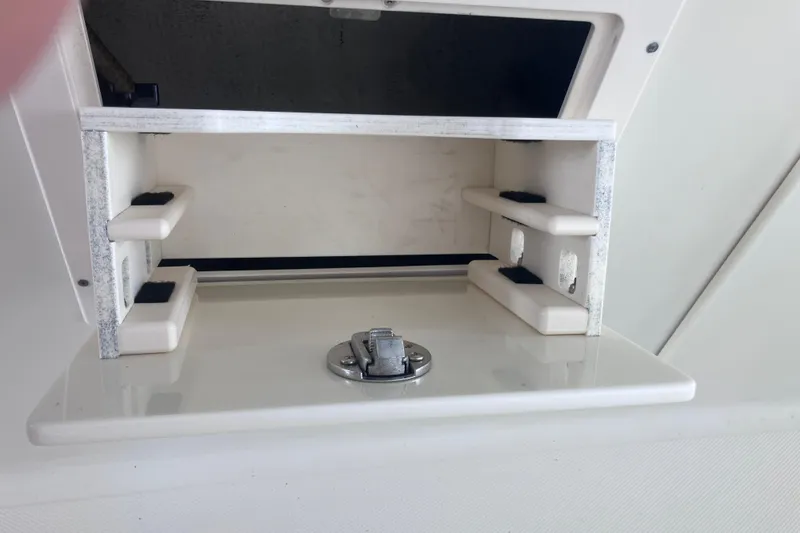 Slide: The Image of 2008 Hydra-Sports Vector 2900 CC storage compartment with latch, open and empty. - 44