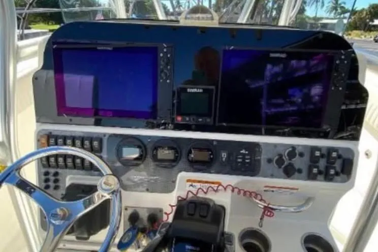 Slide: The Image of 2008 Hydra-Sports Vector 2900 CC boat under a metal shelter on a trailer. - 5