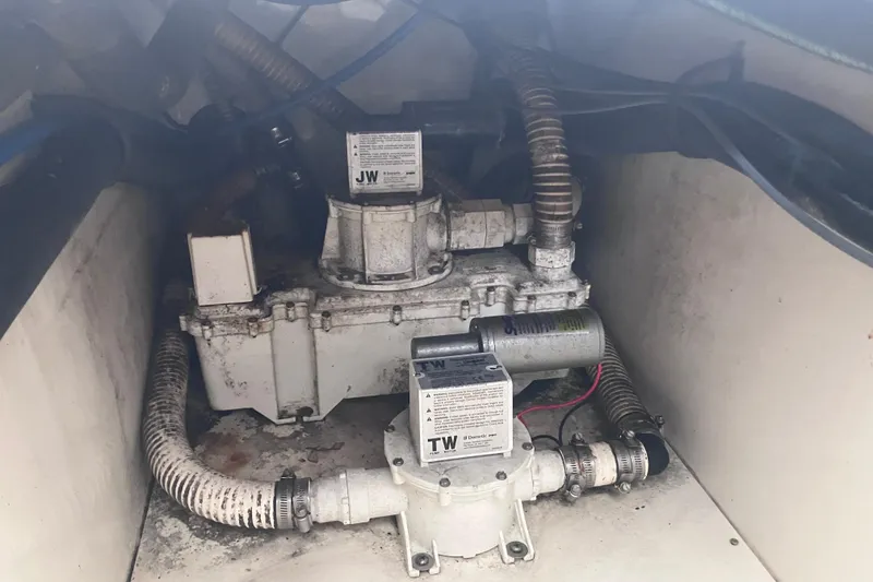 Slide: The Image of 2008 Hydra-Sports Vector 2900 CC bilge area with pumps and hoses. - 51