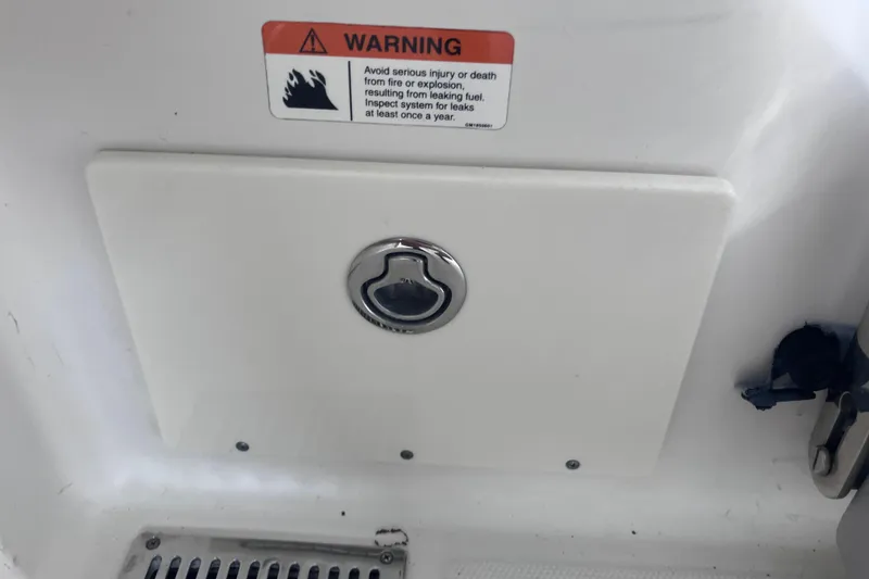 Slide: The Image of 2008 Hydra-Sports Vector 2900 CC warning label and hatch detail. - 55