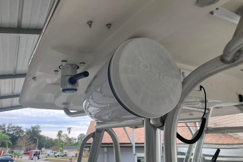 Slide: The Image of 2008 Hydra-Sports Vector 2900 CC boat with mounted speaker and rod holder under canopy. - 60