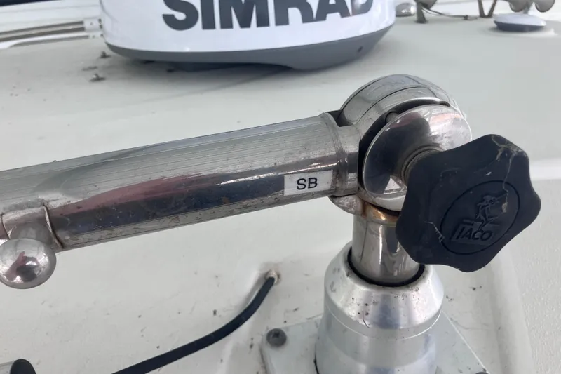 Slide: The Image of Close-up of a 2008 Hydra-Sports Vector 2900 CC boat's metal fitting with Simrad equipment. - 61