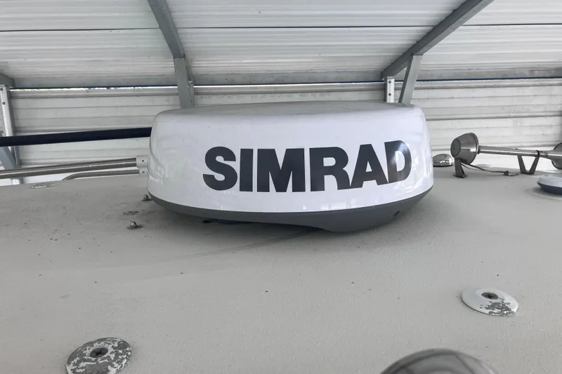 Slide: The Image of Simrad radar on 2008 Hydra-Sports Vector 2900 CC boat under shelter. - 63