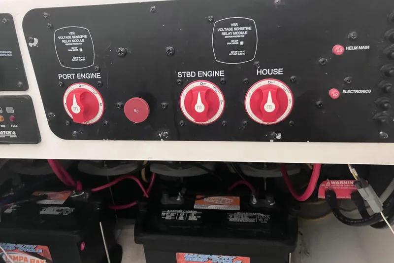 Slide: The Image of Control panel of a 2008 Hydra-Sports Vector 2900 CC boat with battery switches. - 67