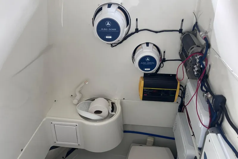 Slide: The Image of 2008 Hydra-Sports Vector 2900 CC interior with speakers, wiring, and toilet paper holder. - 68