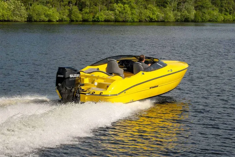 Slide: The Image of Stingray 23 OCX 2025 boat with deck details and fuel cap. - 18