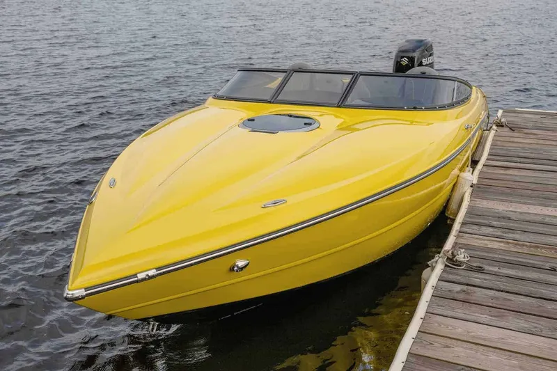 Slide: The Image of Interior of 2025 Stingray 23 OCX boat with beige seating. - 20