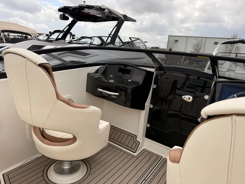 Slide: The Image of Interior of the 2025 Stingray 23 OCX boat. - 22