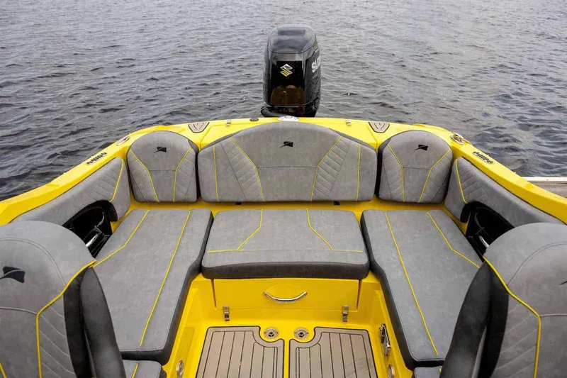 Slide: The Image of Stingray 23 OCX 2025 boat with Suzuki outboard motor. - 5
