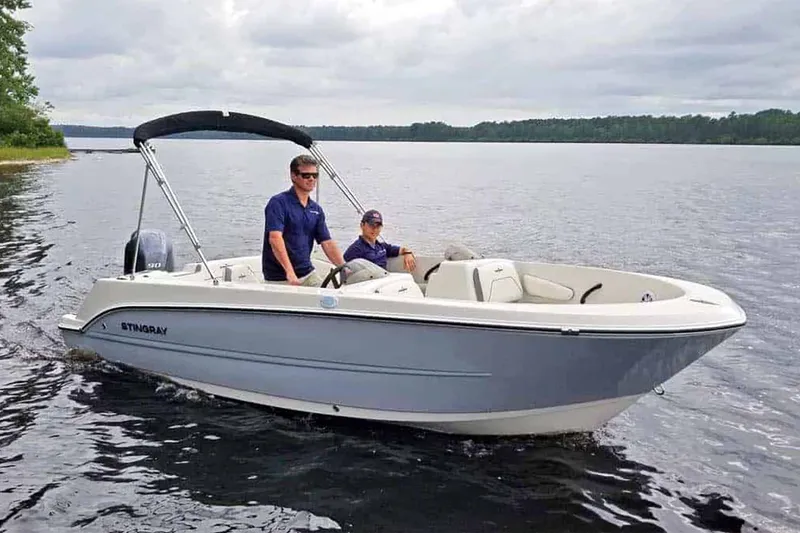 Slide: The Image of Interior of 2025 Stingray 172 DC boat with white seating. - 16