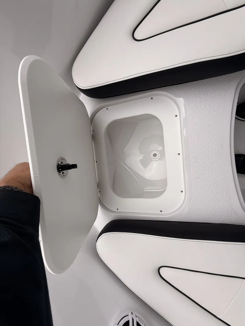 Slide: The Image of Stingray 172 DC 2025 boat, open storage compartment. - 30