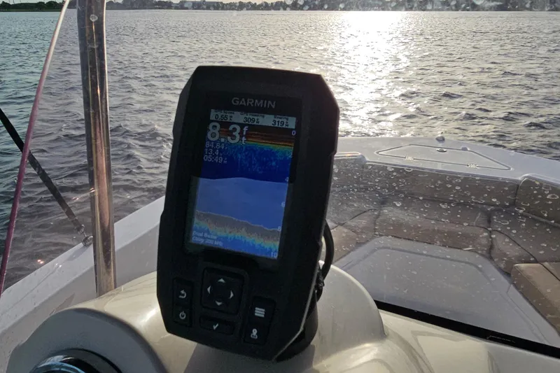 Slide: The Image of Garmin fishfinder on 2021 NauticStar 191 Hybrid boat, displaying water depth and temperature. - 33