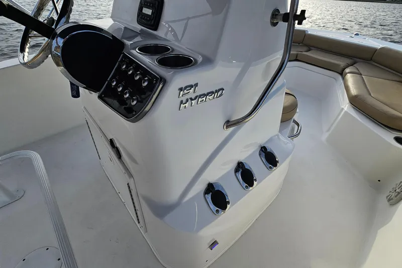 Slide: The Image of 2021 NauticStar 191 Hybrid boat interior with console and seating area. - 36