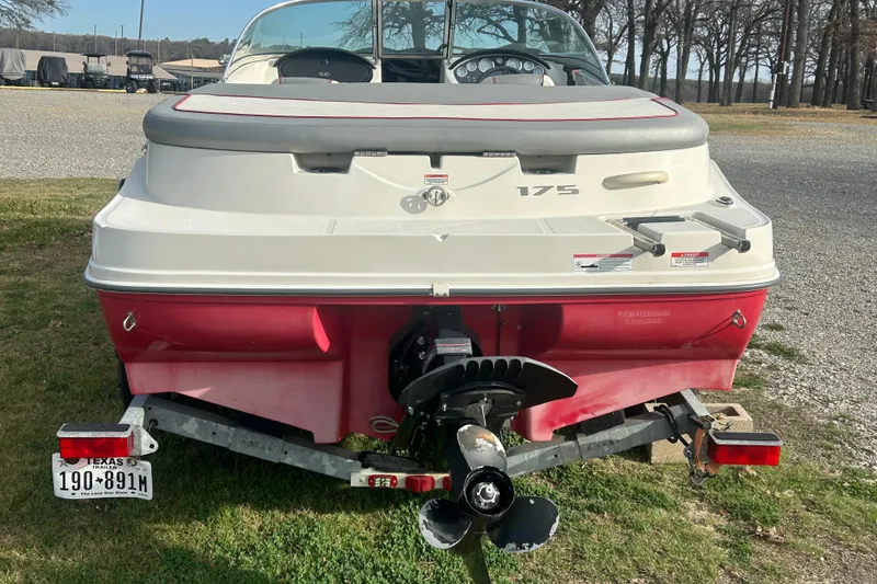 Slide: The Image of 2008 Sea Ray 175 Bow Rider boat on trailer, rear view, parked outdoors. - 4