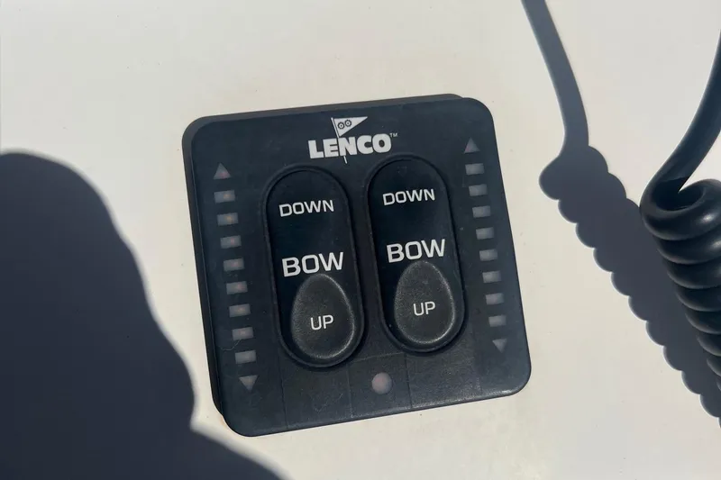 Slide: The Image of Lenco trim tab control panel on 2005 Edgewater 245CC boat. - 13