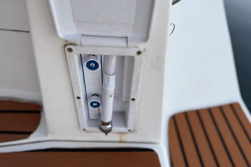 Slide: The Image of Hunter 31 boat shower controls, 2007 model, featuring hot and cold water options. - 17