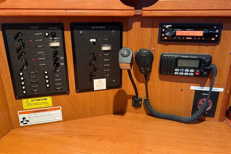 Slide: The Image of Electrical control panel of a 2007 Hunter 31 sailboat with communication devices. - 24