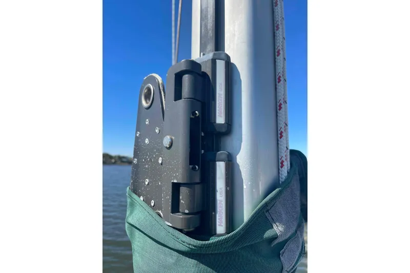 Slide: The Image of Close-up of a Catalina 320 sailboat mast with Harken hardware, 1995 model. - 112