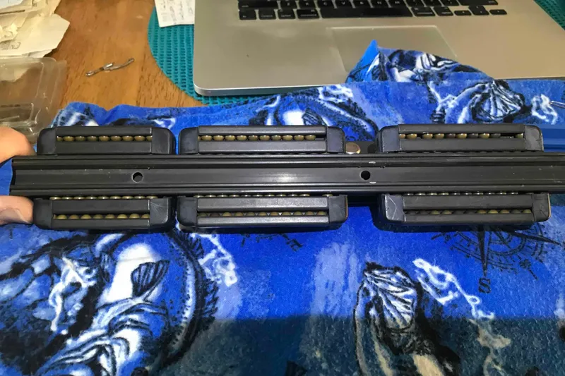 Slide: The Image of Sail hardware for 1995 Catalina 320, featuring rigging components and sailcloth. - 115