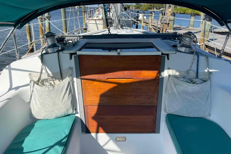 Slide: The Image of Battery compartment of a Catalina 320 sailboat, labeled "Tank 1." - 64