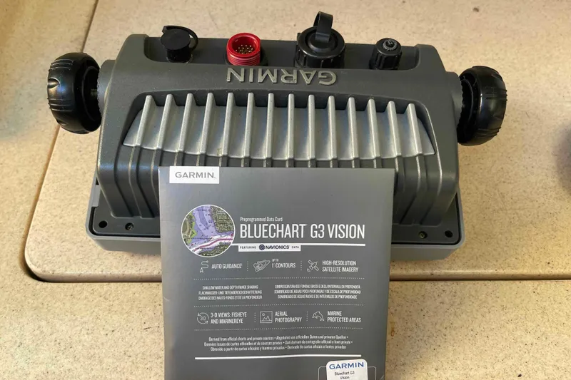 Slide: The Image of Garmin GPSmap 740s displaying nautical chart. - 70