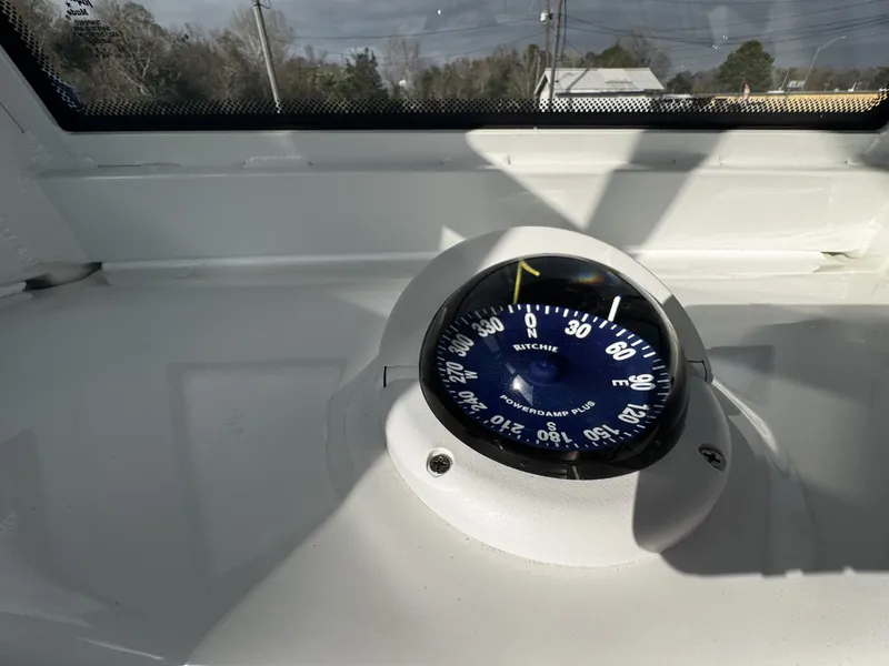 Slide: The Image of Compass on Tidewater 2500 Carolina Bay 2026 boat. - 24