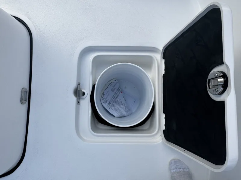 Slide: The Image of Tidewater 2500 Carolina Bay 2026 boat hatch with bucket. - 36