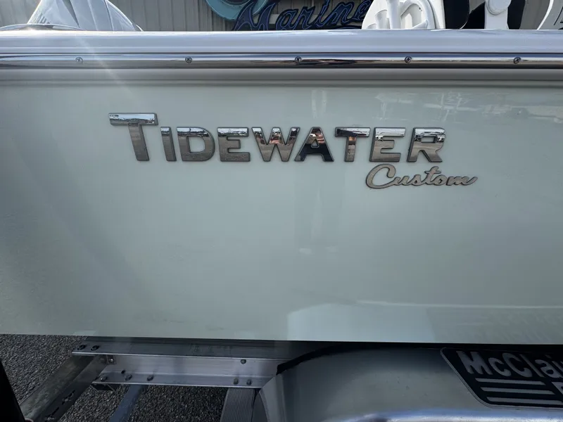 Slide: The Image of Tidewater 2500 Carolina Bay 2026 boat, side view with logo. - 6