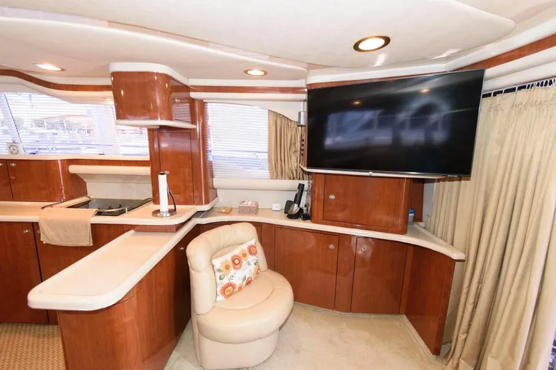 Slide: The Image of Luxurious interior of 2004 Sea Ray 480 Sedan Bridge yacht with modern amenities. - 18