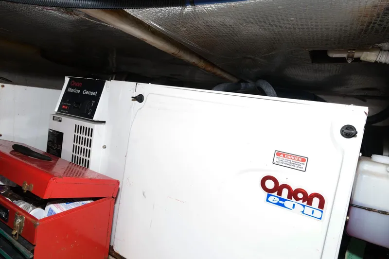 Slide: The Image of Onan generator in 2004 Sea Ray 480 Sedan Bridge engine room. - 33
