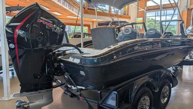 Slide: The Image of 2026 Ranger 2050MS boat with Mercury Pro XS engine in showroom. - 3