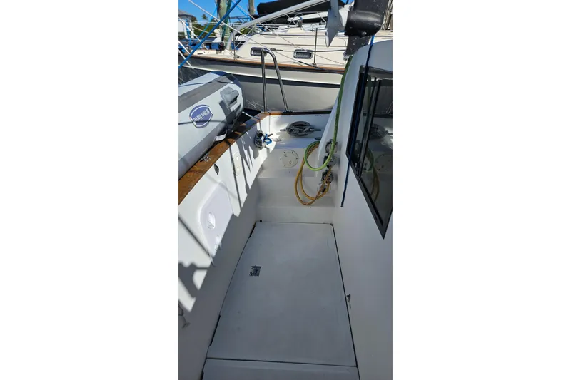 Slide: The Image of 1984 Albin Palm Beach 37 boat deck with equipment and hoses. - 11