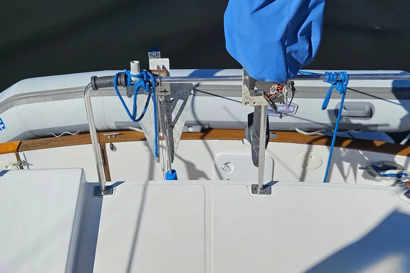 Slide: The Image of 1984 Albin Palm Beach 37 boat deck with blue ropes and equipment. - 25