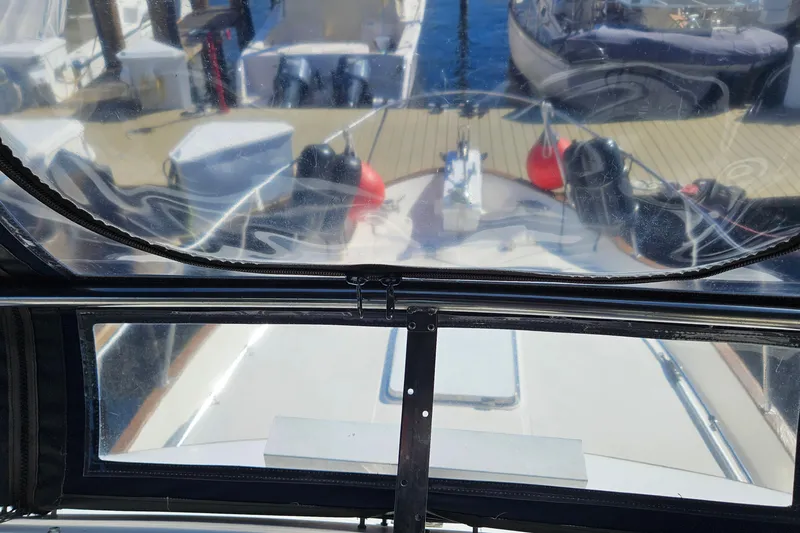 Slide: The Image of 1984 Albin Palm Beach 37 yacht cockpit view with marina background. - 17