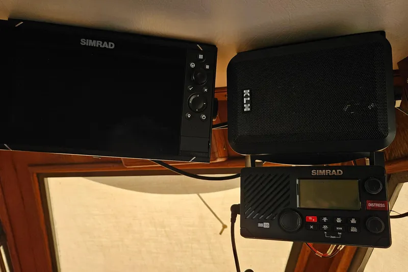 Slide: The Image of Simrad marine electronics on 1984 Albin Palm Beach 37 boat dashboard. - 50