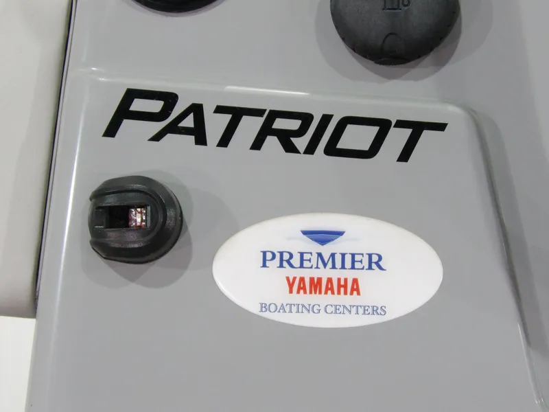Slide: The Image of 2024 Freedom 18 Patriot Cat boat console with Yamaha logo. - 10