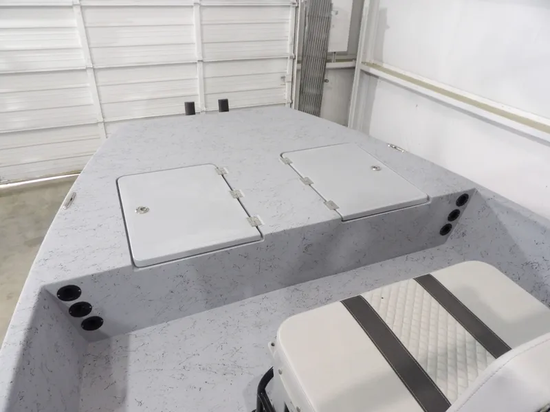 Slide: The Image of 2024 Freedom 18 PATRIOT CAT boat with storage compartments and seating. - 12