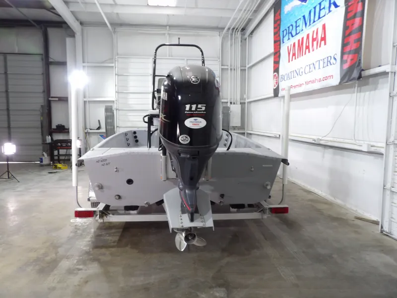 Slide: The Image of 2024 Freedom 18 PATRIOT CAT boat with Yamaha engine in warehouse. - 7